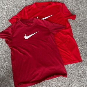 Nike Kids Red Short Sleeve Tees (1 medium and 1 large)
